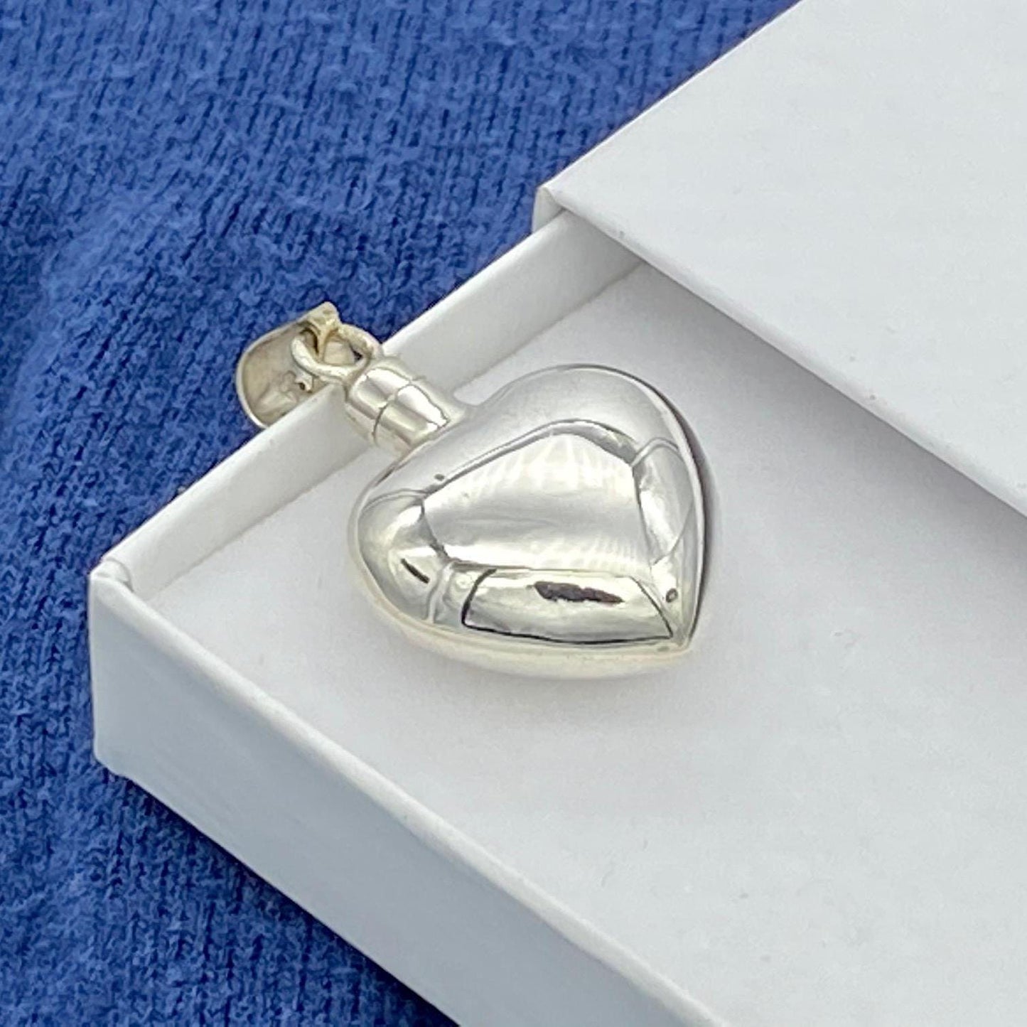 silver heart urn in white box