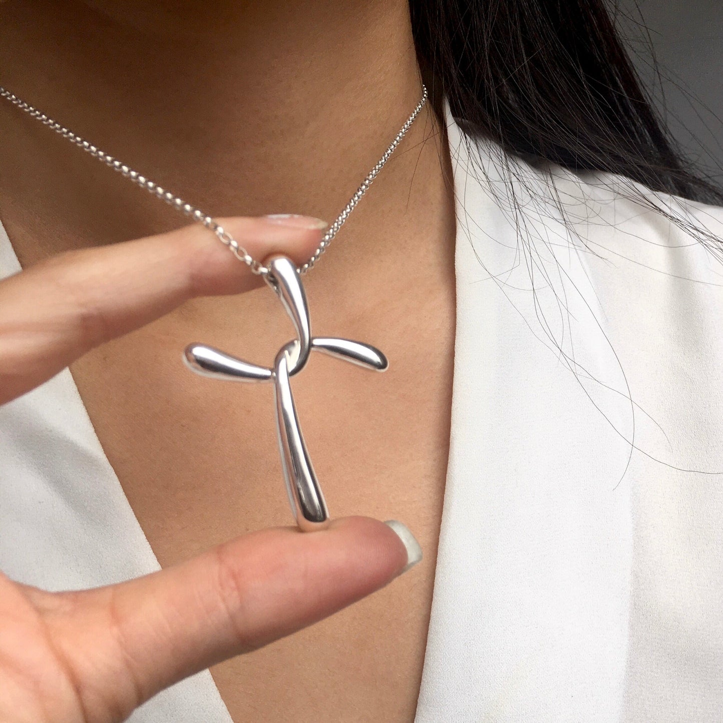 Curvy X Sterling Silver Modern Cross Pendant