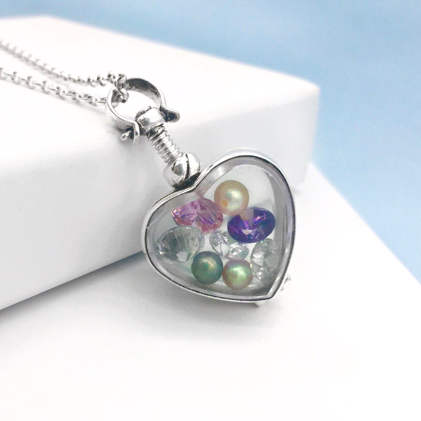 Heart Shaped Birthstone Locket containing birthstones