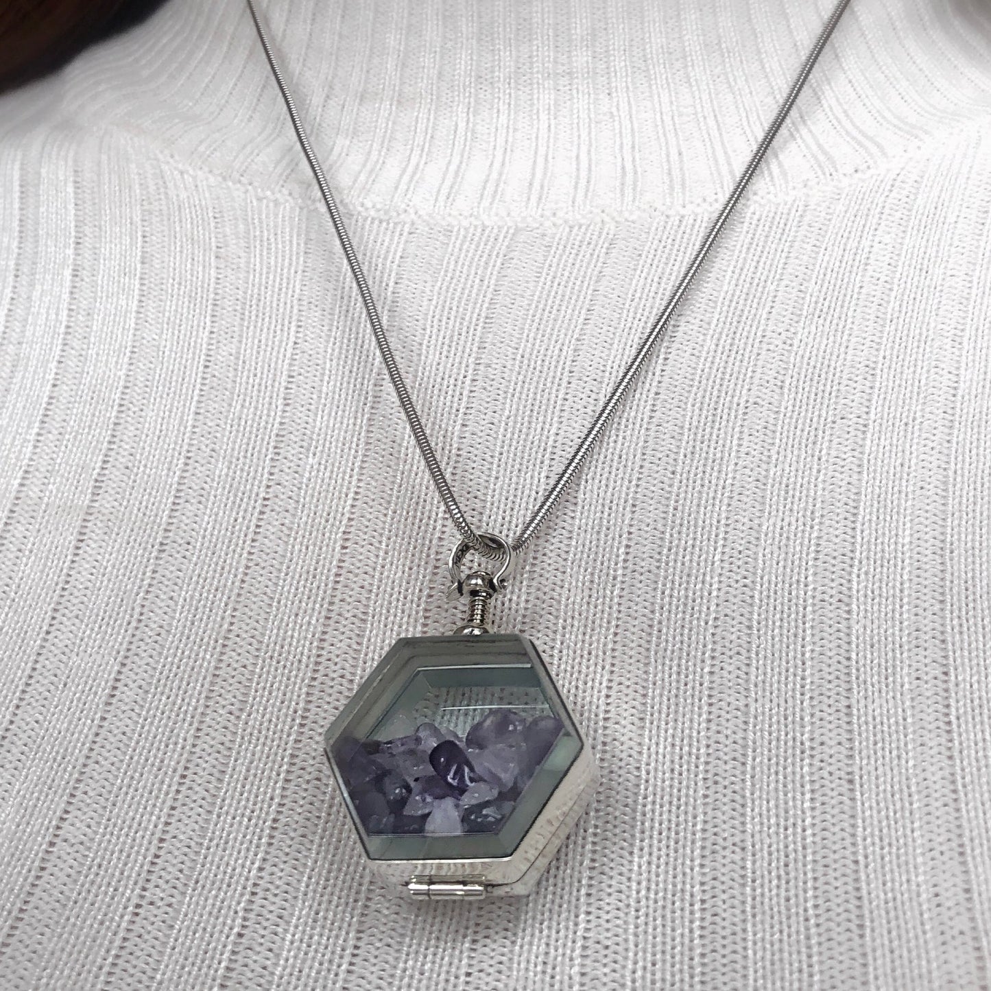 hexagonal beehive locket with deep void inside for diamonds