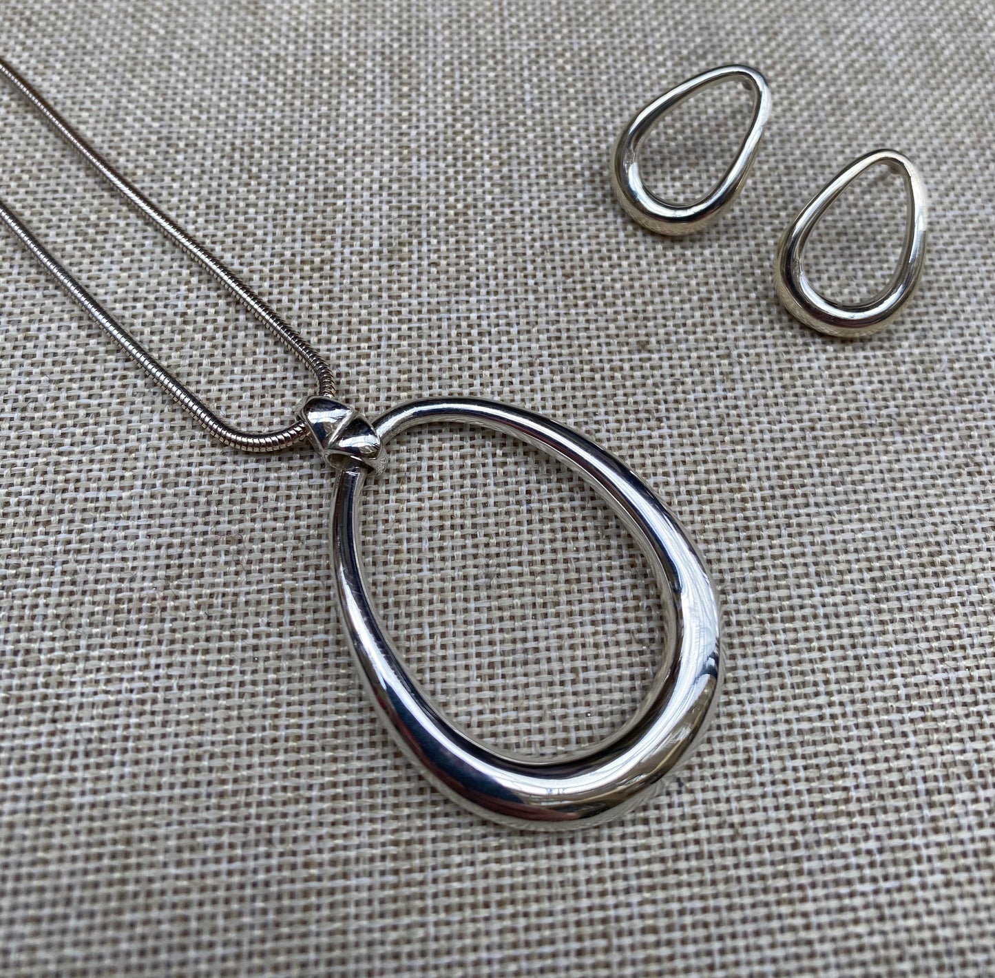 teardrop silver necklace with matching earrings