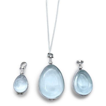 all 3 sizes shown of our teardrop lockets... from left to right... small, large and medium