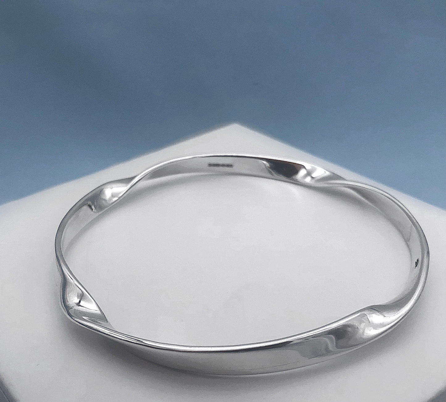 Twisted Circle Solid Silver Bangle