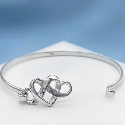 Interlocking Hearts Sterling Silver Bangle Bracelet